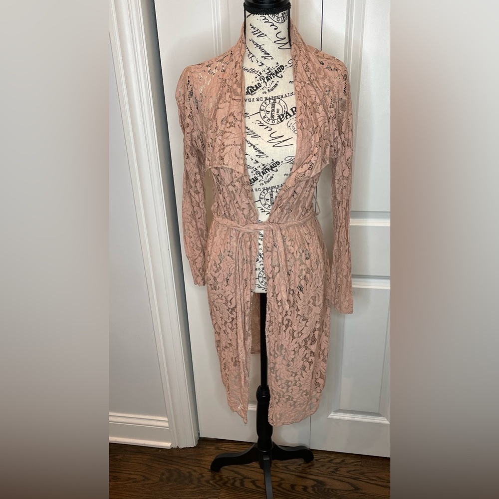 Gently used blush lace trench cover up.